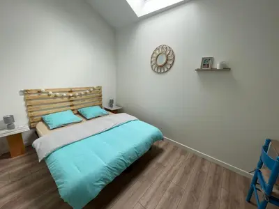 Un ou plusieurs lits dans un hébergement de l'établissement Gîte de charme - 3 chambres, 5 lits - de 4 à 7 personnes