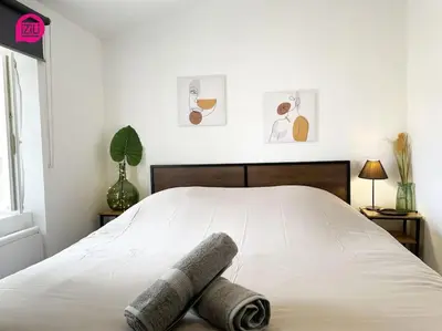 Un ou plusieurs lits dans un hébergement de l'établissement La Brèche Niortaise by CozyLife - Centre Ville- Gare
