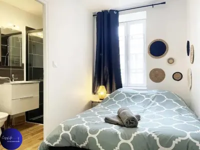 Un ou plusieurs lits dans un hébergement de l'établissement Le Duplex Niortais by CozyLife - Calme et Cosy