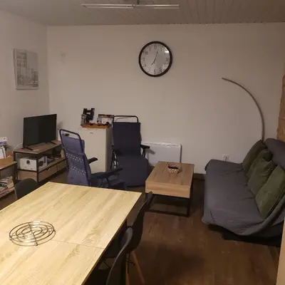 Coin salon dans l'établissement Chez SamB