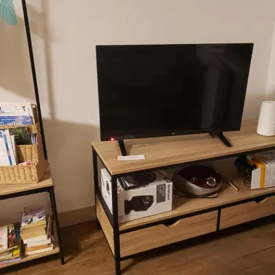Télévision ou salle de divertissement dans l'établissement Chez SamB