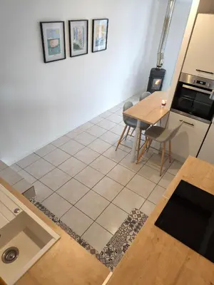 Cuisine ou kitchenette dans l'établissement Appart'cosy - 7 personnes