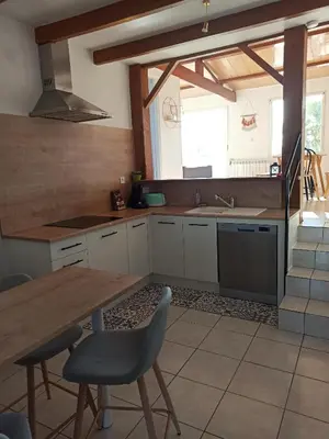 Cuisine ou kitchenette dans l'établissement Appart'cosy - 7 personnes