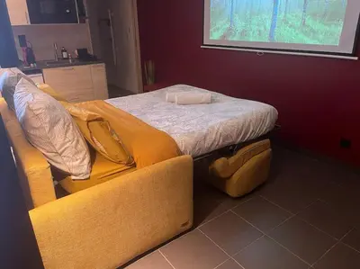 Un ou plusieurs lits dans un hébergement de l'établissement Suite avec Sauna 36m²