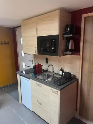 Cuisine ou kitchenette dans l'établissement Suite avec Sauna 36m²