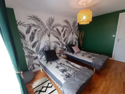 Un ou plusieurs lits dans un hébergement de l'établissement Villa Dinah 17 Maison dans la campagne Rochelaise