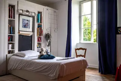 Un ou plusieurs lits dans un hébergement de l'établissement La Barbade