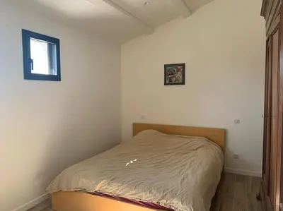 Un ou plusieurs lits dans un hébergement de l'établissement Maison terrasse proche centre ville et ile de Ré