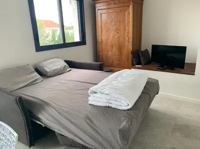 Un ou plusieurs lits dans un hébergement de l'établissement Maison terrasse proche centre ville et ile de Ré
