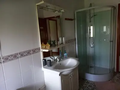 Salle de bains dans l'établissement Le Papillon