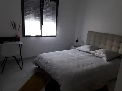 Un ou plusieurs lits dans un hébergement de l'établissement Maison neuve de standing 150 m2