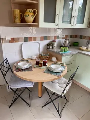 Cuisine ou kitchenette dans l'établissement Le Petit Noyer