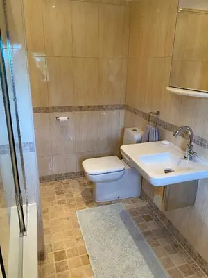 Salle de bains dans l'établissement Le Petit Noyer