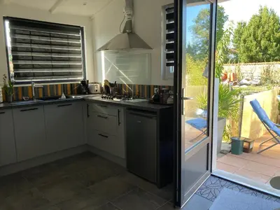 Cuisine ou kitchenette dans l'établissement Le Cube