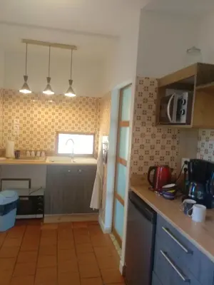 Cuisine ou kitchenette dans l'établissement La Petite Maison dans la Prairie