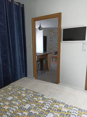 Un ou plusieurs lits dans un hébergement de l'établissement Maison d'hôtes cosy & agréable à 5min du Futuroscope