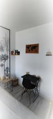Coin salon dans l'établissement Cosy confort appart Cognac