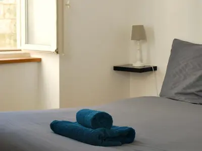 Un ou plusieurs lits dans un hébergement de l'établissement Le coeur d'Angoulême, calme et spacieux