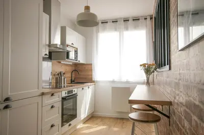 Cuisine ou kitchenette dans l'établissement La Belle Epoque - Proche Gare - Parking Gratuit