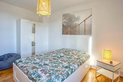 Un ou plusieurs lits dans un hébergement de l'établissement Le Havre Chic et Spacieux d'Angoulême - Calme & Confort Moderne