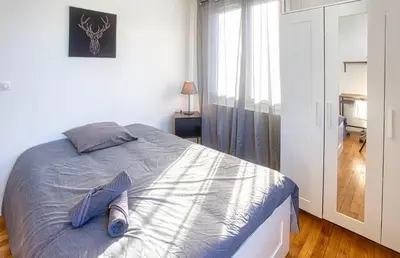 Un ou plusieurs lits dans un hébergement de l'établissement Le Havre Chic et Spacieux d'Angoulême - Calme & Confort Moderne