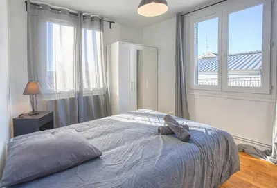 Un ou plusieurs lits dans un hébergement de l'établissement Le Havre Chic et Spacieux d'Angoulême - Calme & Confort Moderne