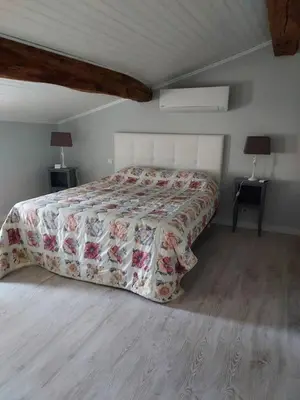 Un ou plusieurs lits dans un hébergement de l'établissement Maisonnette