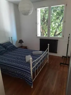 Un ou plusieurs lits dans un hébergement de l'établissement Maison au Calme, prés du centre Parking Privé