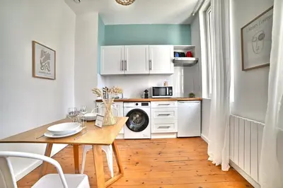 Cuisine ou kitchenette dans l'établissement Le Petit Vauban - Beach and center