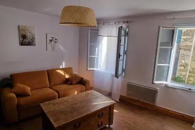 Coin salon dans l'établissement Le Pavillon bleu Vouvant - Gite Maison
