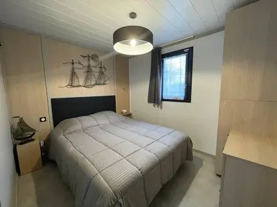 Un ou plusieurs lits dans un hébergement de l'établissement Chalet cosy proche mer