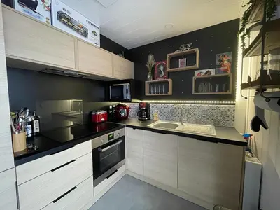 Cuisine ou kitchenette dans l'établissement Chalet cosy proche mer