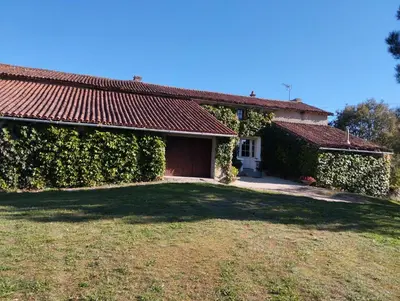 Jardin de l'établissement Maison au calme avec vue étang