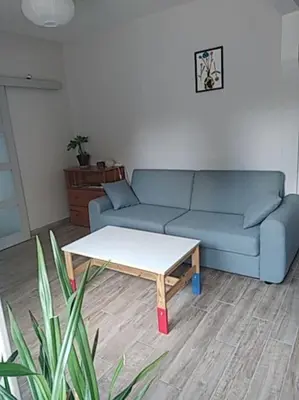 Coin salon dans l'établissement Le spiti, maison agréable avec stationnement privatif