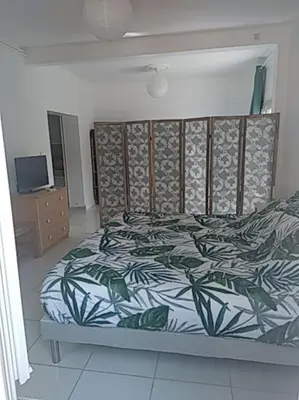 Un ou plusieurs lits dans un hébergement de l'établissement Le spiti, maison agréable avec stationnement privatif