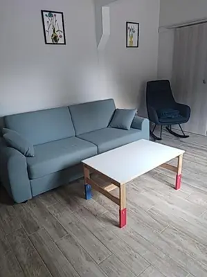 Coin salon dans l'établissement Le spiti, maison agréable avec stationnement privatif