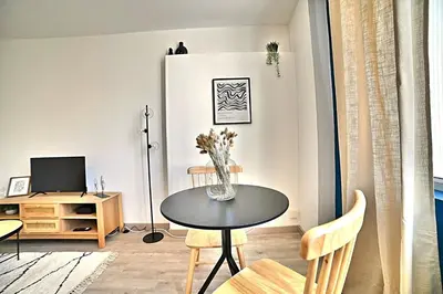 Télévision ou salle de divertissement dans l'établissement L'escapade Fourasine - Heart of Fouras