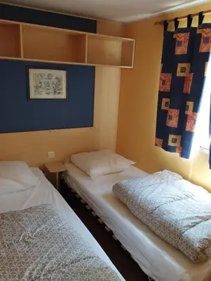 Un ou plusieurs lits dans un hébergement de l'établissement Camping de Bourg Charente