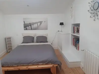 Un ou plusieurs lits dans un hébergement de l'établissement Maison de campagne 10 personnes.