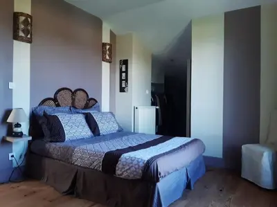 Un ou plusieurs lits dans un hébergement de l'établissement Maison de campagne 10 personnes.