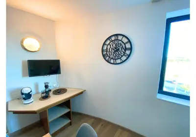 Télévision ou salle de divertissement dans l'établissement AU 237'- Résidence Aquatis - Futuroscope - La Conciergerie.