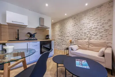 Cuisine ou kitchenette dans l'établissement Le Cocon Urbain en Hyper Centre