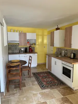 Cuisine ou kitchenette dans l'établissement Un petit coin de paradis