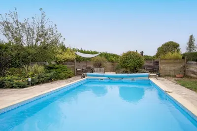 Piscine de l'établissement Villa Migron - Charmante maison avec piscine ou située à proximité