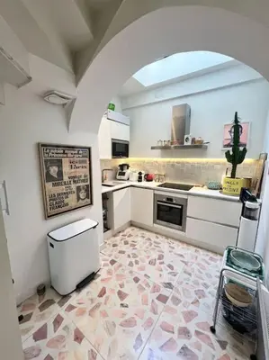 Cuisine ou kitchenette dans l'établissement Le SeptièmeArt - Coeur de ville