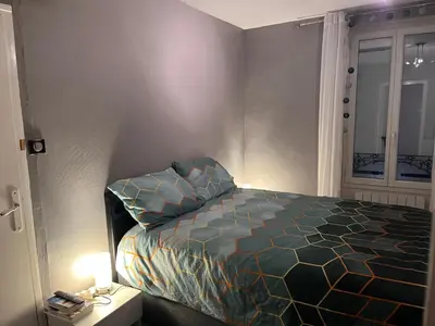 Un ou plusieurs lits dans un hébergement de l'établissement Maisonnette proche gare très agréable