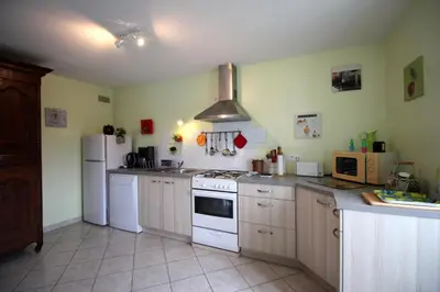 Cuisine ou kitchenette dans l'établissement Mazette