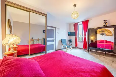 Un ou plusieurs lits dans un hébergement de l'établissement Chambre Nuit d'Asie