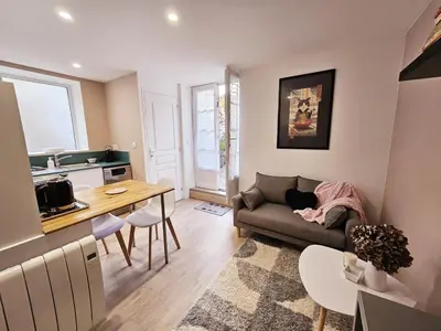 Télévision ou salle de divertissement dans l'établissement Côté cour chaleureuse maison de ville