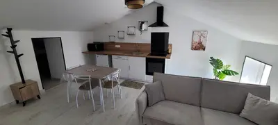 Coin salon dans l'établissement Appartement proche Futuroscope